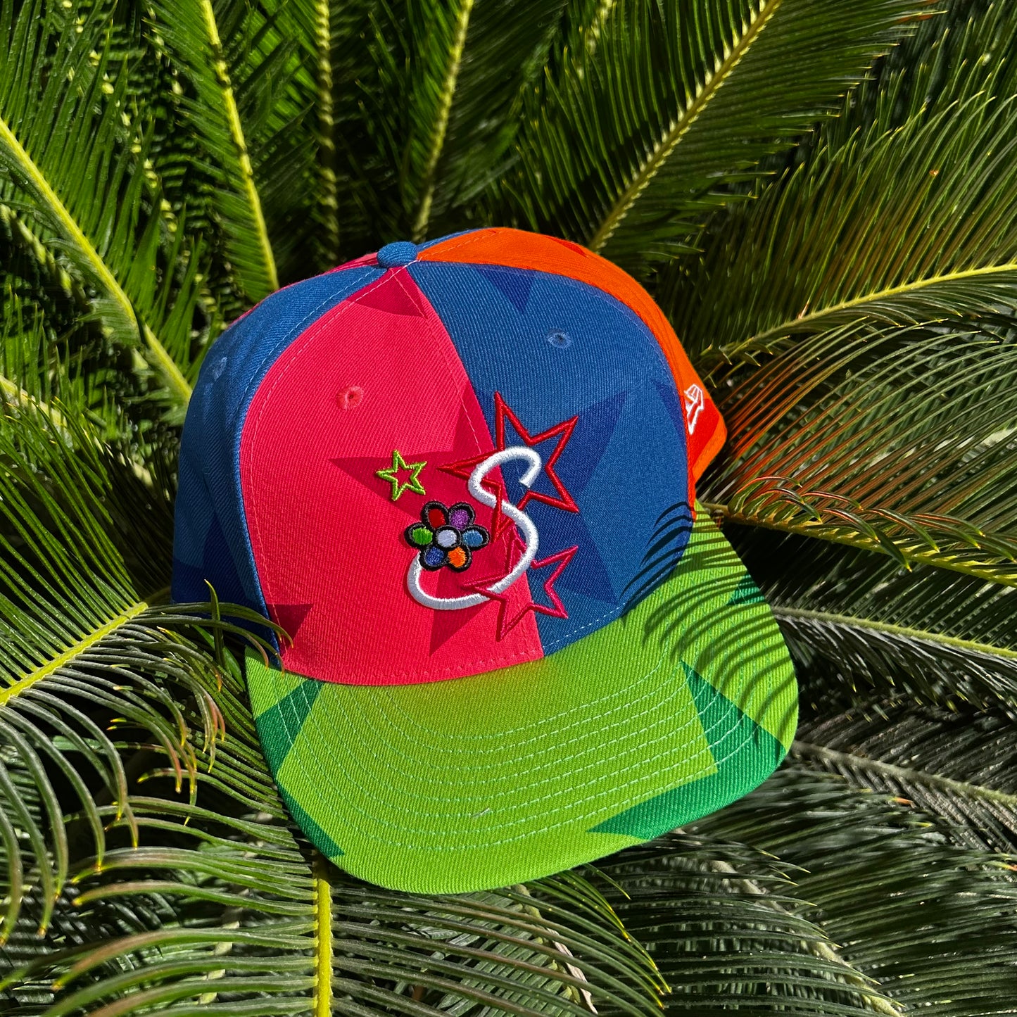 Gorra New Era x Savior Worldwide “Neon Star Pinwheel”
