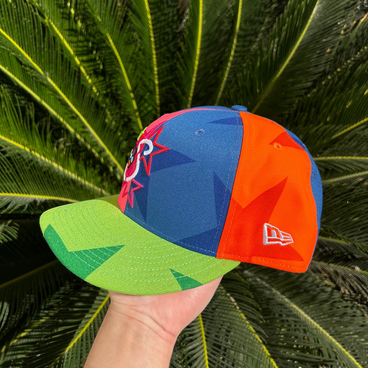 Gorra New Era x Savior Worldwide “Neon Star Pinwheel”