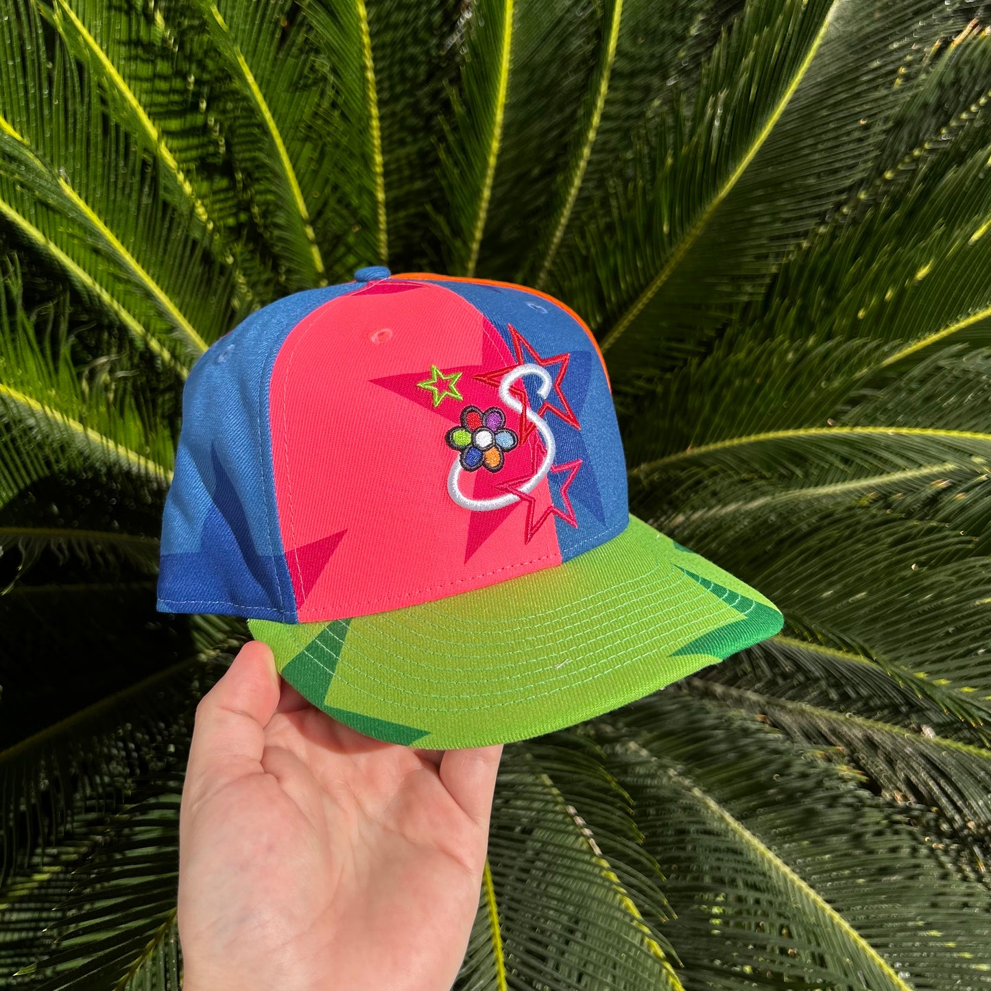 Gorra New Era x Savior Worldwide “Neon Star Pinwheel”